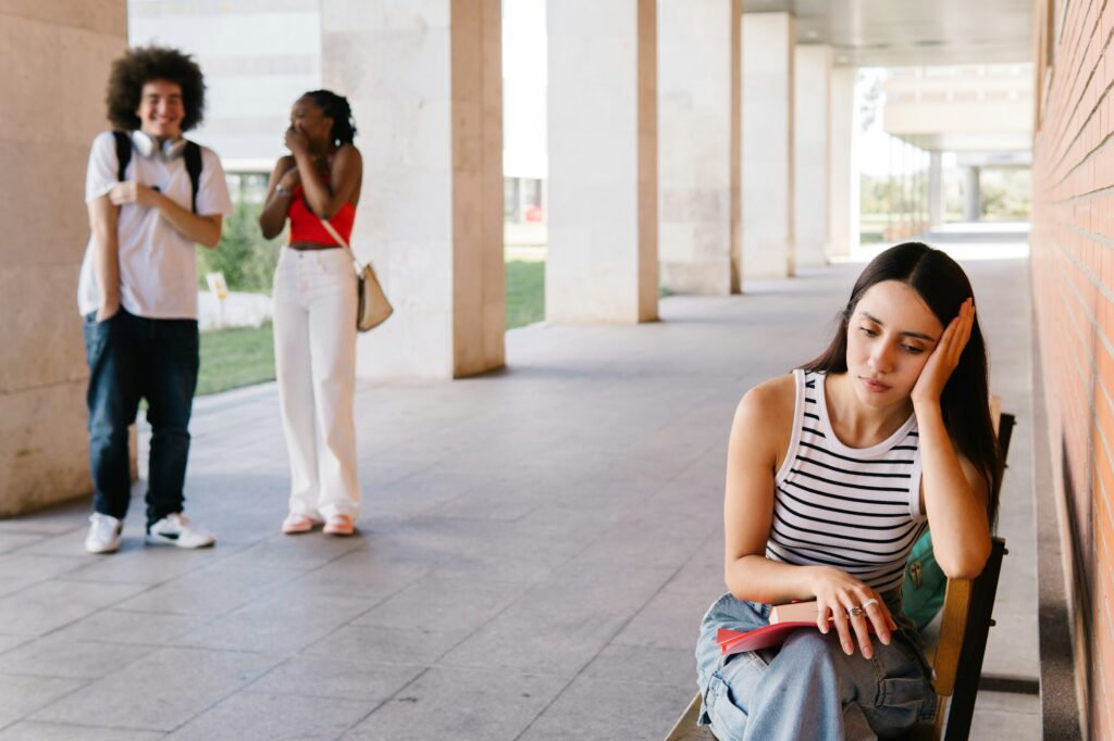 Student suffering bullying and discrimination. Social problems, mental health and depression.